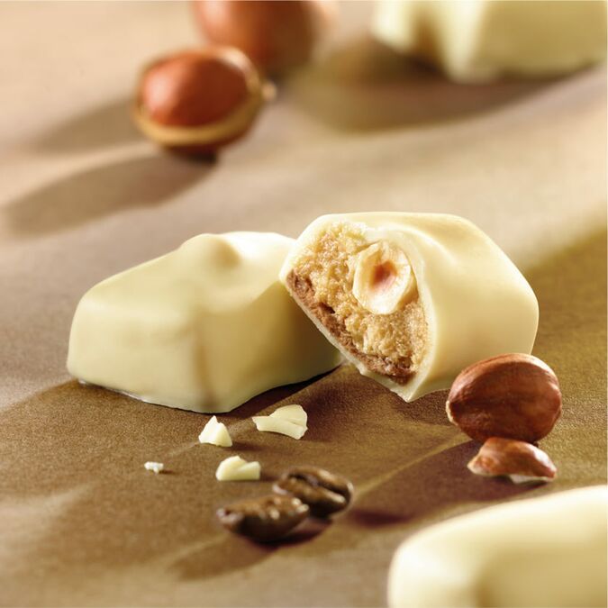 Finisare manuală a pralinelor Leonidas Manon